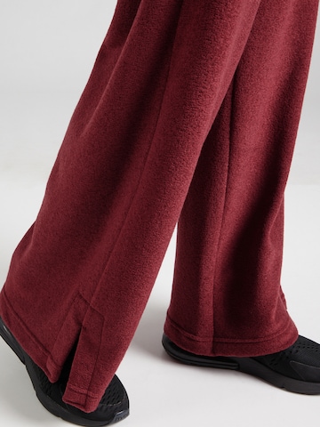 Nike Sportswear Široký strih Nohavice 'PHNX' - Červená
