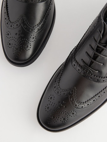 Chaussure à lacets Next en noir