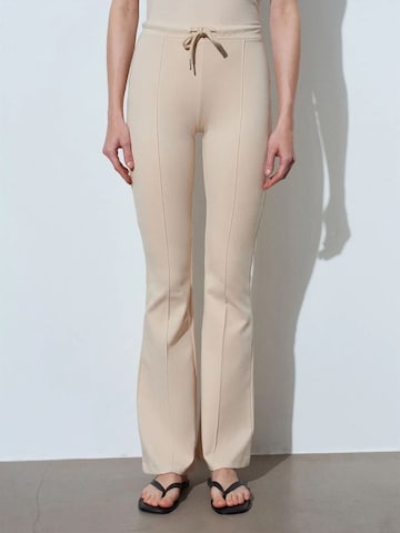 Dilvin Flared Pants in Beige