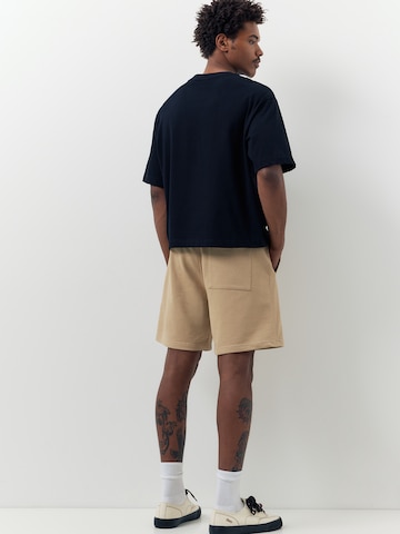 Pull&Bear Loosefit Kalhoty 'STWD' – béžová