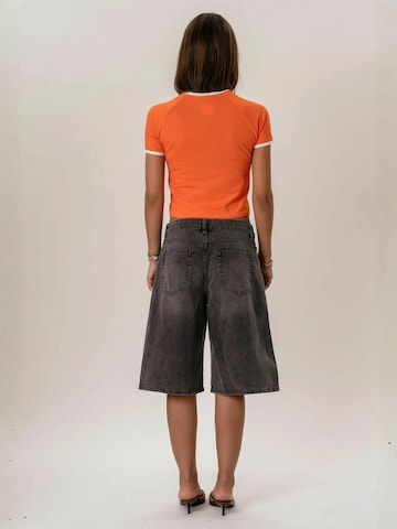 It's May Top ' Rosa ' in Orange