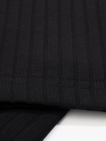 FEMSSY Rozkloszowany krój Spodnie 'SWAY PANTS BLACK' w kolorze czarny