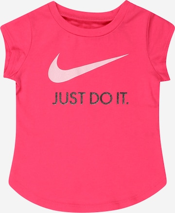 T-Shirt 'SWOOSH' Nike Sportswear en rose : devant