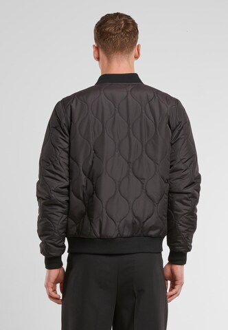 Veste mi-saison 'Onion Quilted' Urban Classics en noir
