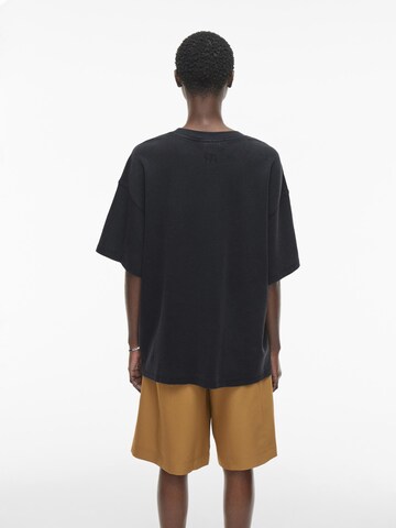 ROUGE EDIT Oversized bluse i blå