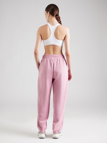 Nike Sportswear Tapered Trousers 'Phoenix Fleece' in Pink