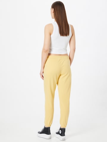 GAP - Tapered Calças em amarelo