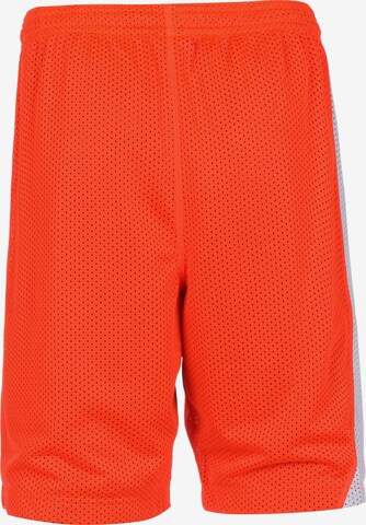 Loosefit Pantaloni sportivi di UNDER ARMOUR in rosso
