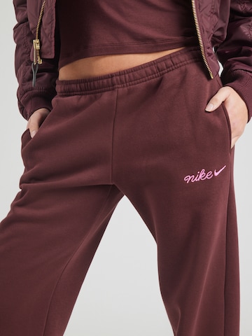 Nike Sportswear Loose fit Trousers 'PHNX FLC' in Red