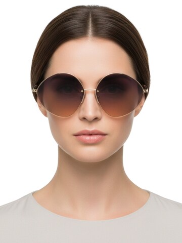 Victoria Beckham - Gafas de sol en oro