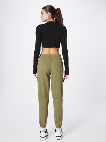 Tapered Pantaloni eleganți 'JAFAR' de la NEW LOOK pe verde