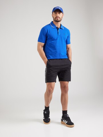 Maglietta di Champion Authentic Athletic Apparel in blu