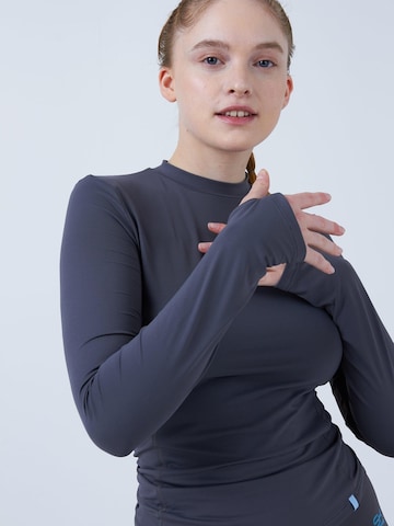 SPORTKIND - Camiseta funcional 'High-Neck' en gris: frente