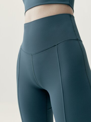 évasé Pantalon de sport ' Elin ' Born Living Yoga en vert