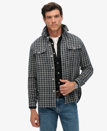 Veste mi-saison Superdry en bleu : devant