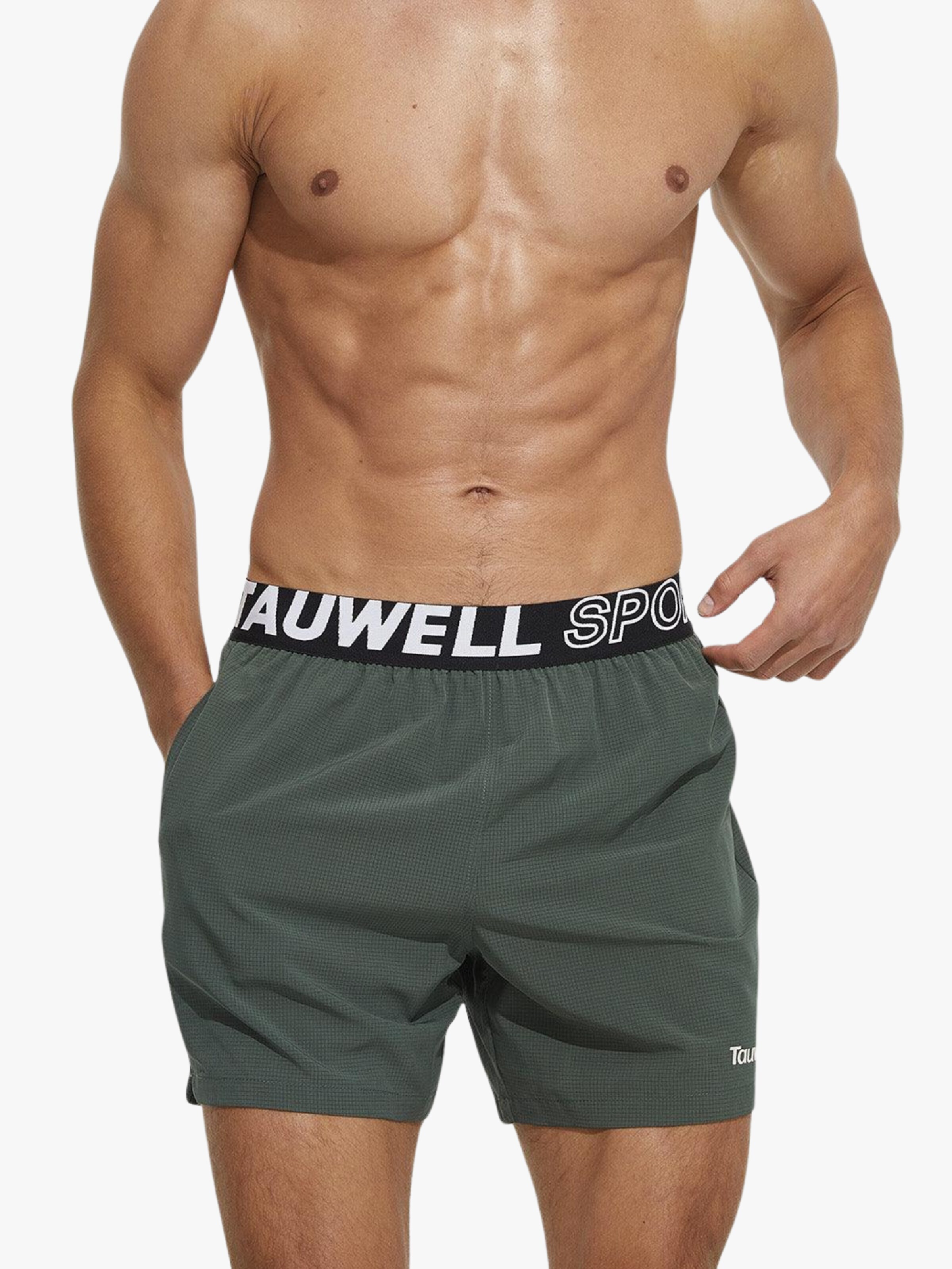 TAUWELL Workout Pants in Green: front