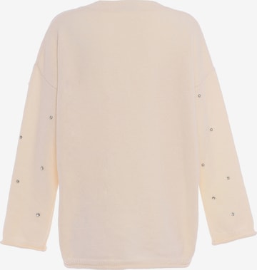 Pullover di faina in bianco