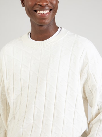Pull-over Calvin Klein Jeans en blanc
