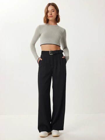 Wide leg Pantaloni di Happiness İstanbul in nero