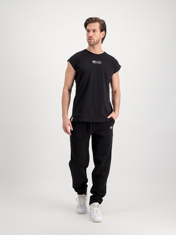 juoda ALPHA INDUSTRIES Siaurėjantis Kelnės