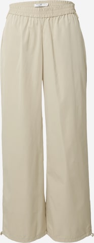 NA-KD Loose fit Pants in Beige: front