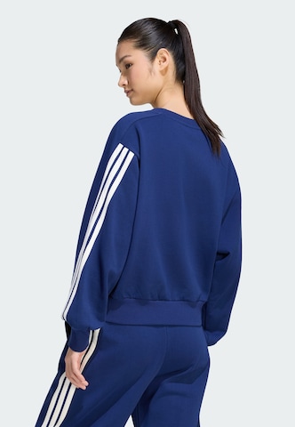 ADIDAS SPORTSWEAR - Camiseta deportiva en azul