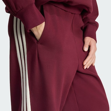 ADIDAS SPORTSWEAR Loosefit Urheiluhousut värissä punainen
