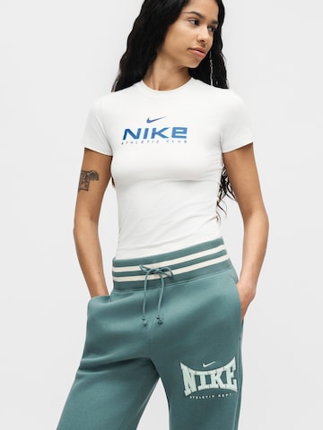 Nike Sportswear Szeroka nogawka Spodnie 'PHX' w kolorze zielony