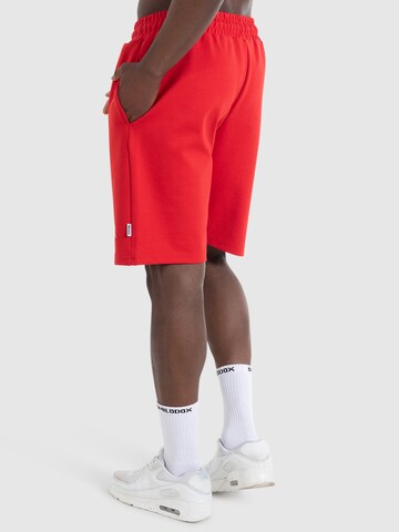 Regular Pantalon de sport 'Nate' Smilodox en rouge