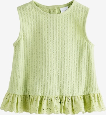 Top di Next in verde: frontale