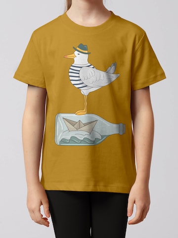 watabout.kids Shirt 'Möwe mit Hut' in Geel: voorkant