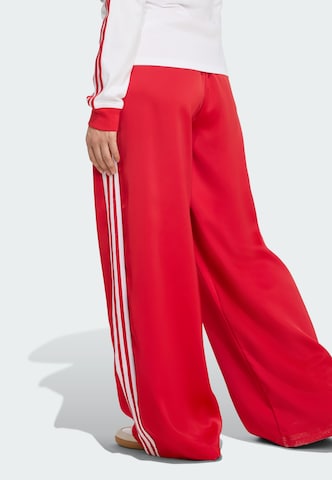 ADIDAS ORIGINALS - Pierna ancha Pantalón 'Adicolor' en rojo