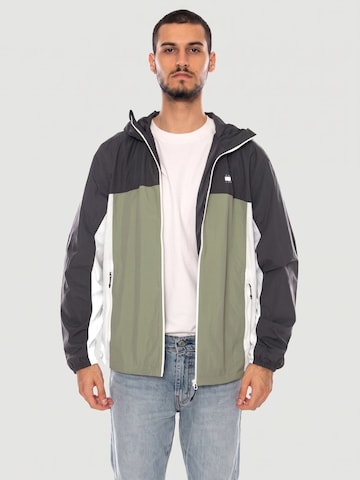 TOMMY HILFIGER Übergangsjacke 'TJM CHICAGO PACKABLE JACKET EXT SPRING OLIVE MULTI'‌‌‌‌‌‌‌ in Mischfarben