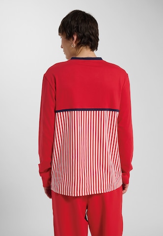 T-Shirt fonctionnel Hummel en rouge
