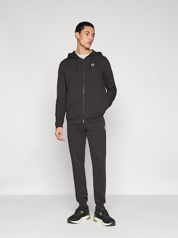 Survêtement 'Essentials Elevated' PUMA en noir : devant