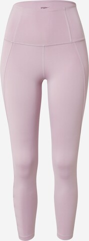 NIKE Skinny Spodnie sportowe w kolorze fioletowy: przód