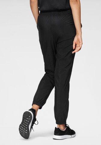 ADIDAS SPORTSWEAR Tapered Workout Pants in Black