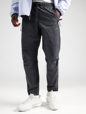 Nike Sportswear - Tapered Pantalón en gris: frente