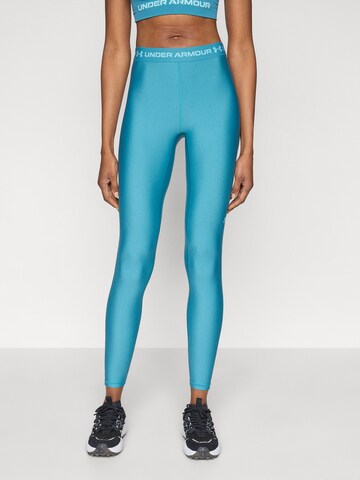 UNDER ARMOUR - Skinny Calças de desporto em azul: frente