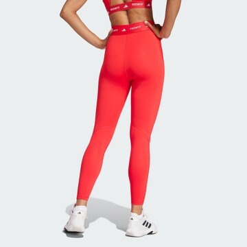 Skinny Pantaloni sportivi di ADIDAS PERFORMANCE in rosso