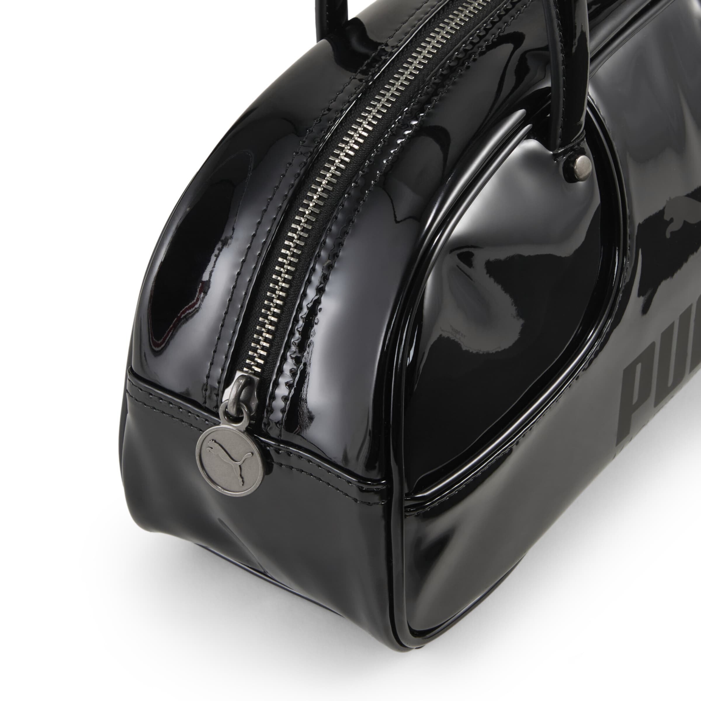 PUMA Schultertasche '1976' in Schwarz