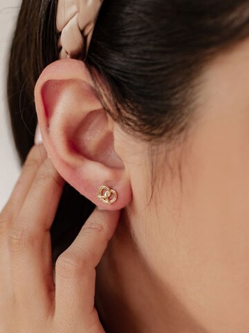 Hey Happiness - Pendientes 'Pretzel Delight' en oro