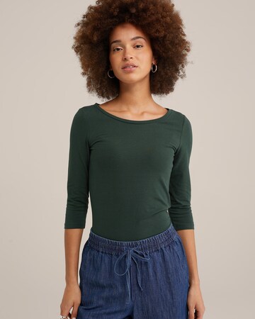 T-shirt WE Fashion en vert : devant