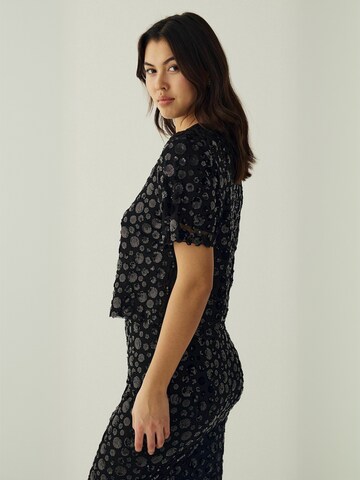 Noella - Top ' N-Mera ' en negro: lado