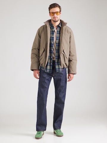 LEVI'S ® Kevad-sügisjope 'Briggs Short Puffer Jacket', värv pruun