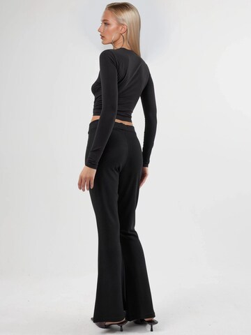 Flared Pantaloni 'Hose' di Hiccup in nero