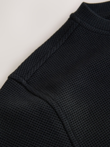 Next - Camiseta en negro