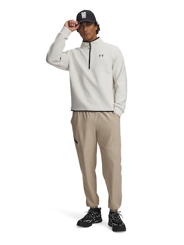 UNDER ARMOUR Tapered Sportbroek 'UA Unstoppable' in Beige: voorkant