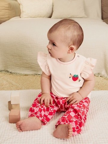 Set Next en rose