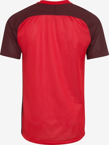 Maglia trikot 'Revolution IV' di NIKE in rosso